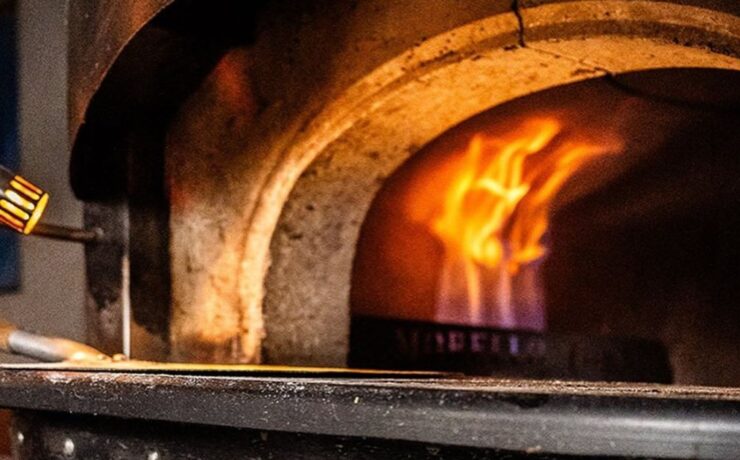 Why We Use a Brick Oven Pizza